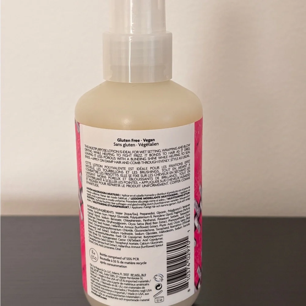 R+Co Zipper Styling Lotion in Pink and White
